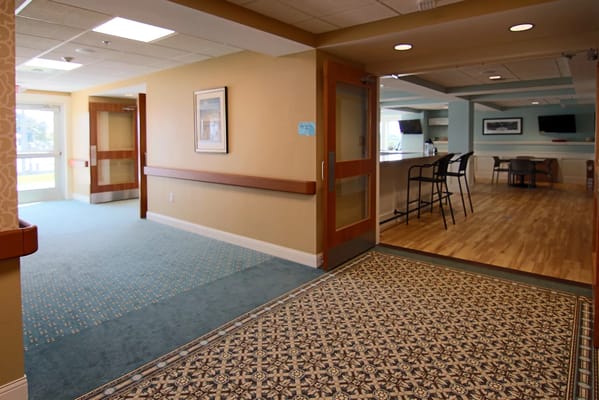 Interior view of a hallway leading to a common area