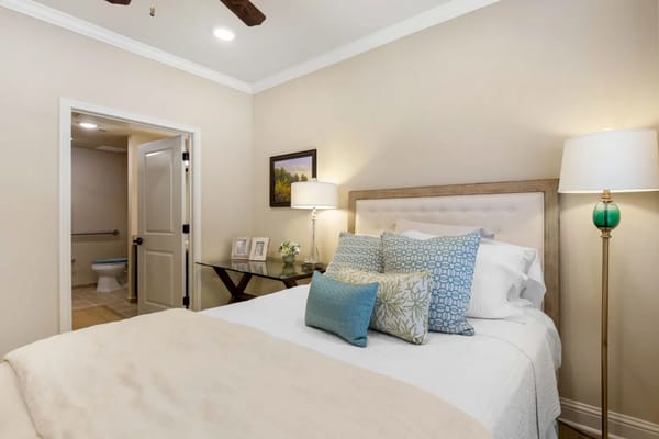 Cozy private resident room with decorative bedding