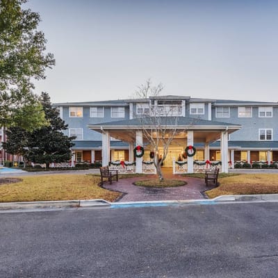 Exterior view of Brightmore of Wilmington with festive decor