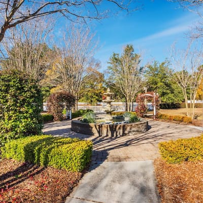 Beautiful garden with a fountain and pathways