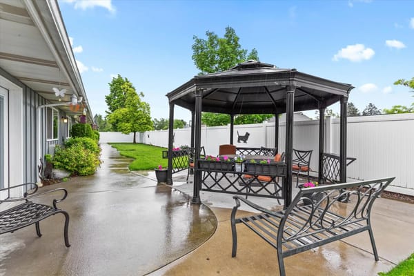 Outdoor seating area with gazebo and benches
