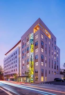 View of Brightview Bethesda Woodmont building exterior at dusk