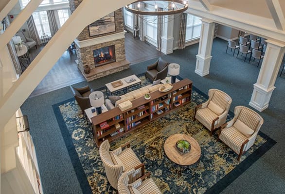 Interior view of a common area with seating and fireplace
