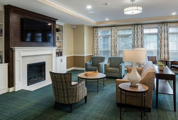 Interior view of a cozy common area with seating