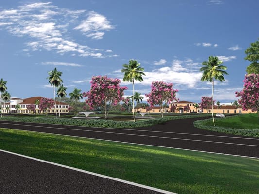 Outdoor view of a senior living facility with gardens