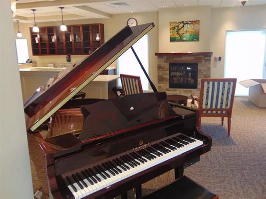 Interior view of a common area with a piano
