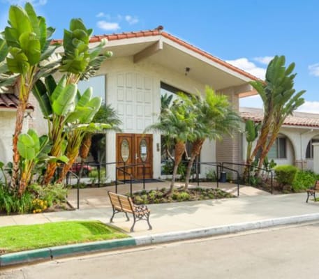 Exterior view of Brittany House with landscaped entrance