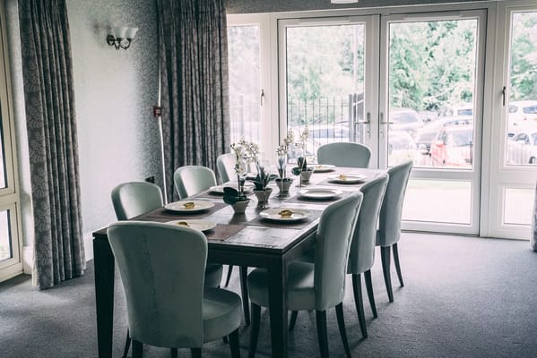 Dining area set with plates and decor