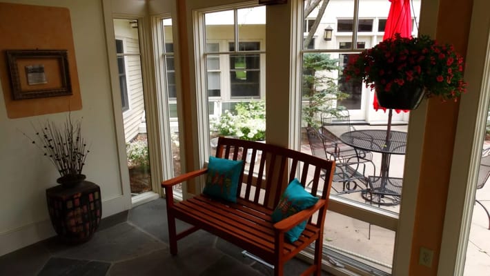 Cozy indoor seating area with garden view