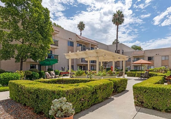 Beautiful outdoor garden area with seating and landscaping