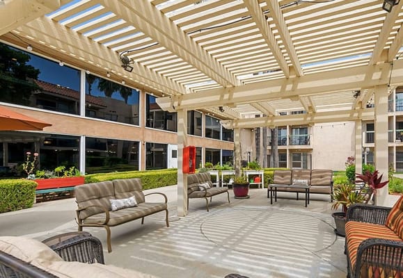 Outdoor seating area with shaded pergola