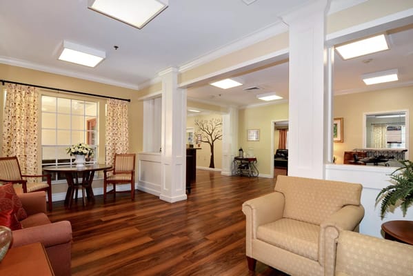 Bright common area with comfortable seating and decor