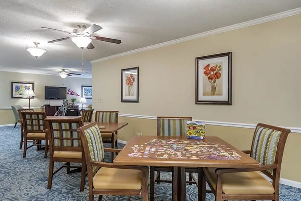 Common area with tables and decor