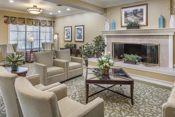 Common area with seating and a fireplace