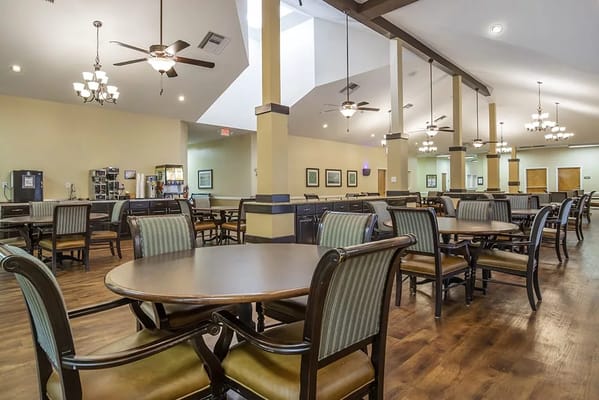 Bright dining area with tables and chairs