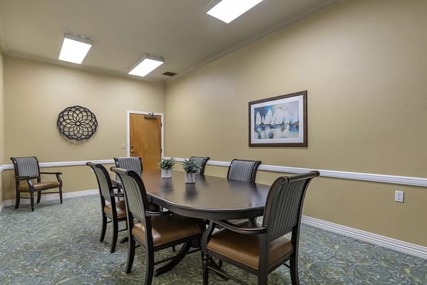 Interior view of a common dining area with tables and chairs