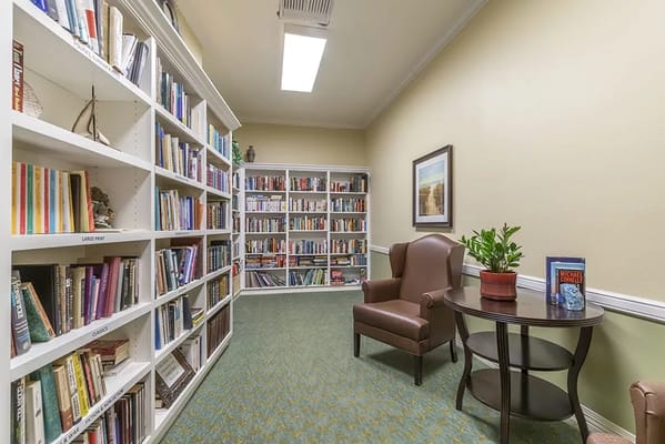 Bright library area with bookshelves and seating