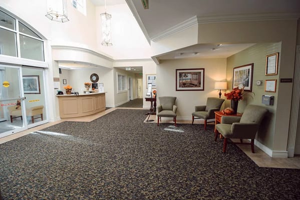 Common area lobby with seating and reception desk