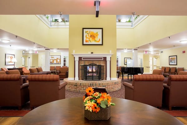 Common area with seating and a fireplace