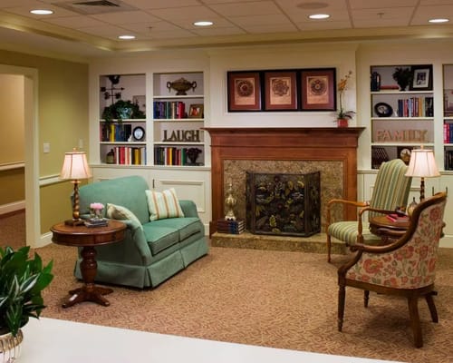 Cozy common area with comfortable seating and a fireplace