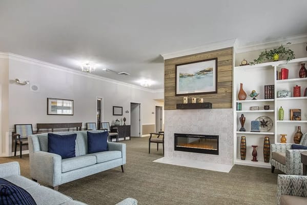 Bright common area with comfortable seating and decorations