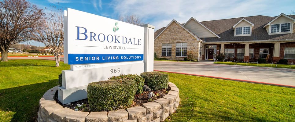 Exterior view of Brookdale Lewisville facility sign and building