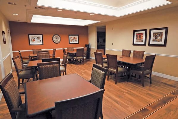 Interior view of a common area with tables and chairs
