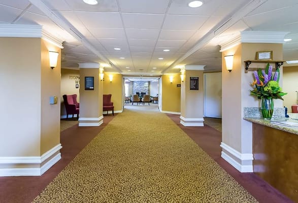 Interior corridor with seating and decor