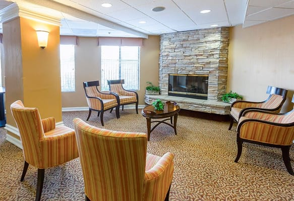 Comfortable lounge area with seating and fireplace