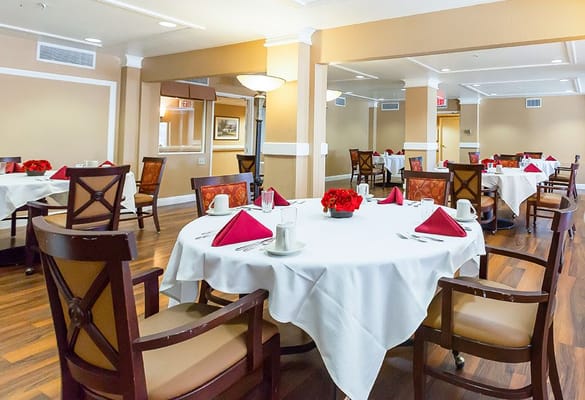 Dining area with tables set for a meal