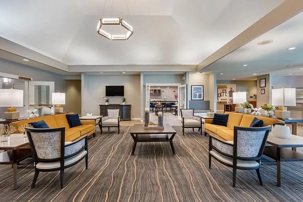 Bright common area with seating and decor