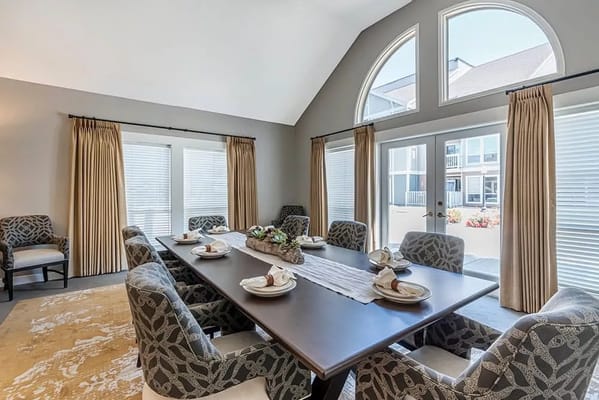 Elegant dining room setup with a large table and chairs