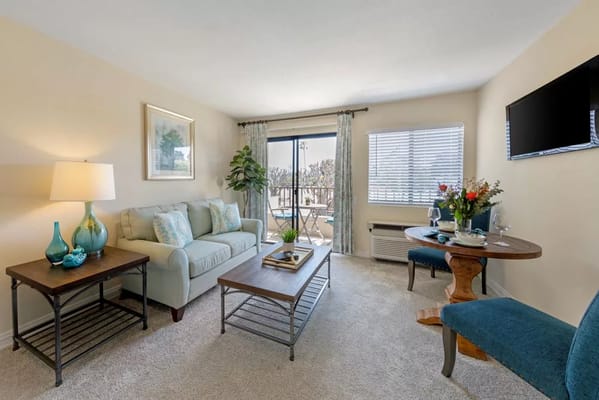 Cozy living room in a resident unit with natural light