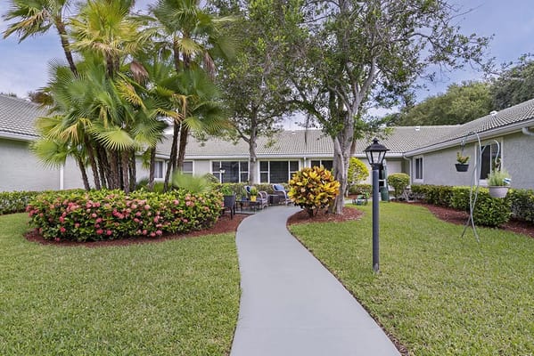 Pathway leading through a landscaped garden