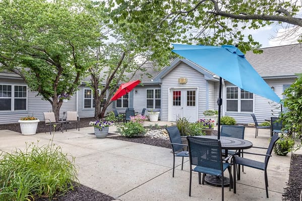Outdoor courtyard with colorful umbrellas and seating