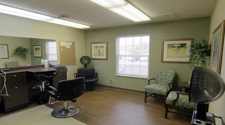 Interior view of a salon area with styling chairs