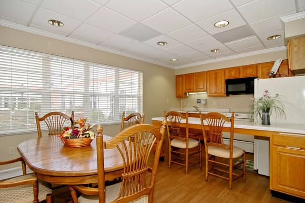 Bright dining area with wooden table and chairs