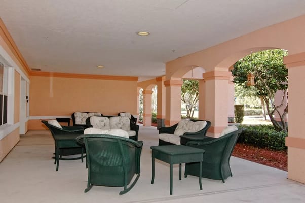 Outdoor seating area with wicker furniture