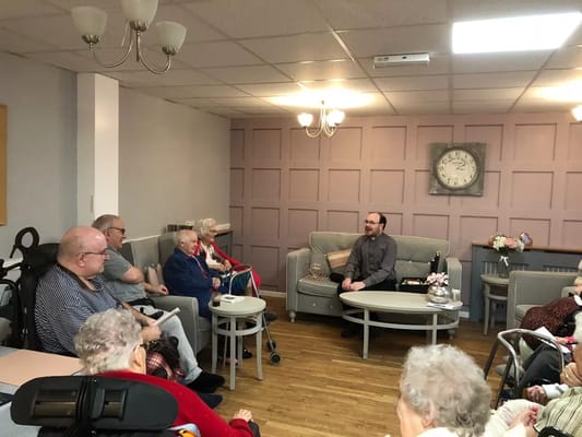 Residents engaging in a group activity in a common area