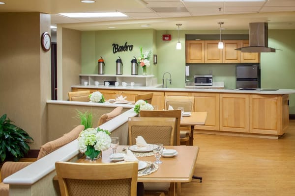 Dining area with tables set for a meal