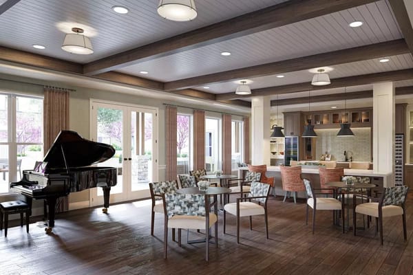 A stylish living room featuring a grand piano and comfortable seating area.