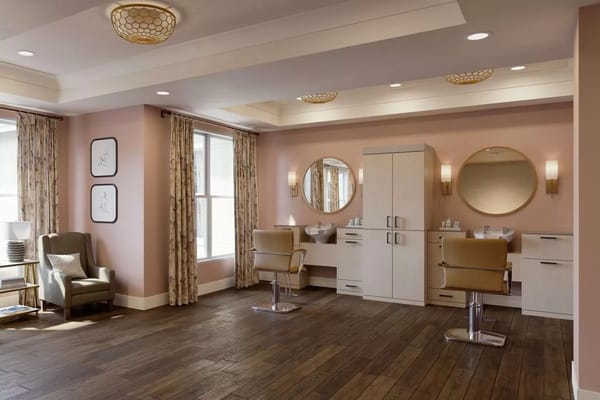 Interior view of the hair salon with styling chairs and mirrors