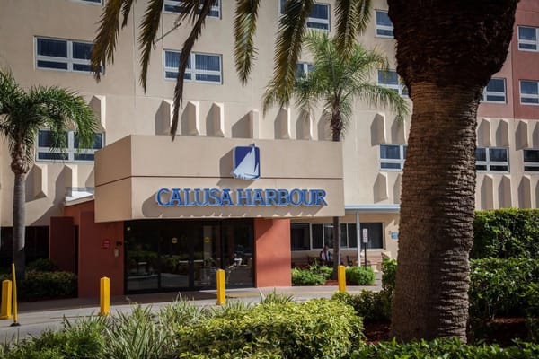 Main entrance of Calusa Harbour with signage