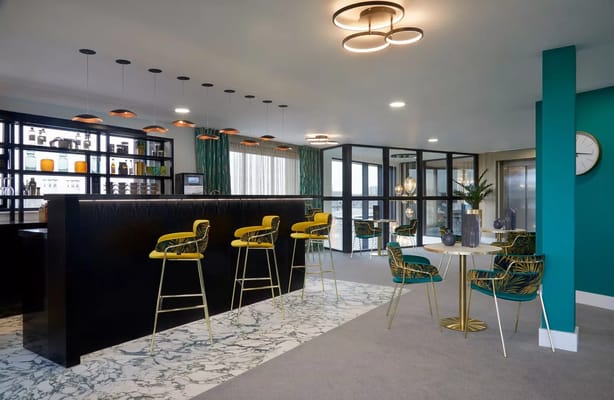 Modern lounge area with stylish bar seating
