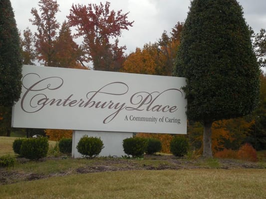 Exterior sign of Canterbury Place with landscaping