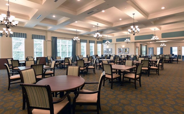 Dining room with tables and chairs set up