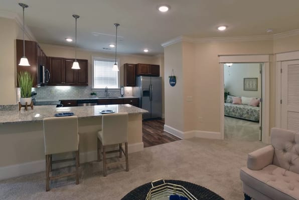 Modern kitchen and living area in a senior facility