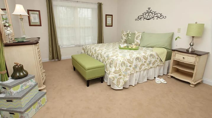 Cozy private bedroom with a bed and decorative elements