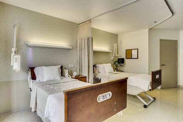 Interior view of a shared resident room with two beds