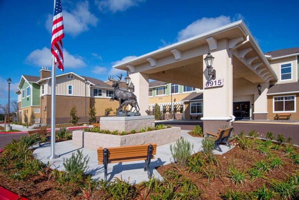 Exterior view of Carlton Senior Living Elk Grove with landscaping